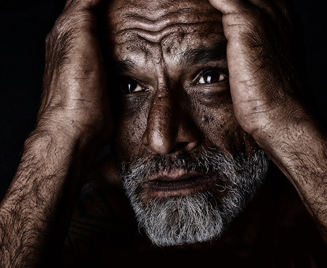 Emotional Image of a  Indian man on Black