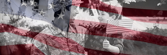 Close-up of an American flag against soldier with son