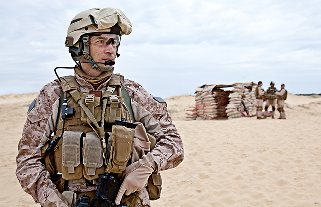 US marines in the desert near the blockpost